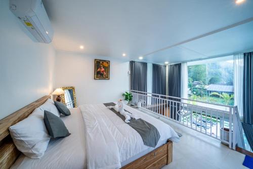 Katil atau katil-katil dalam bilik di Hayana Villa Kintamani