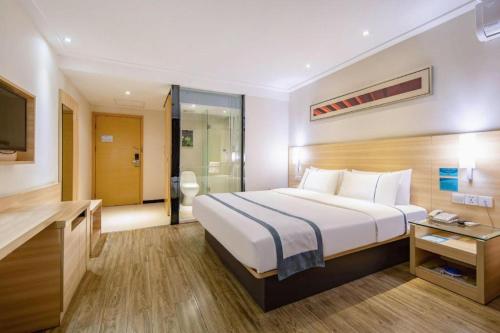 Letto o letti in una camera di City Comfort Inn Nanning Railway Station
