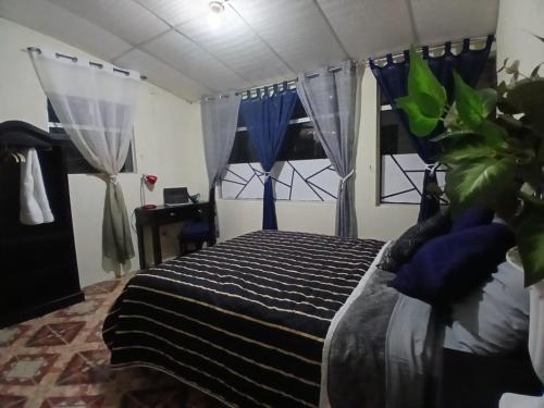 Postel nebo postele na pokoji v ubytování Apartamentos Los Cerezos