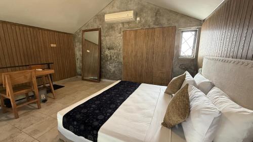 Ένα ή περισσότερα κρεβάτια σε δωμάτιο στο Ambara Villa - Quiet Luxury in Umalas