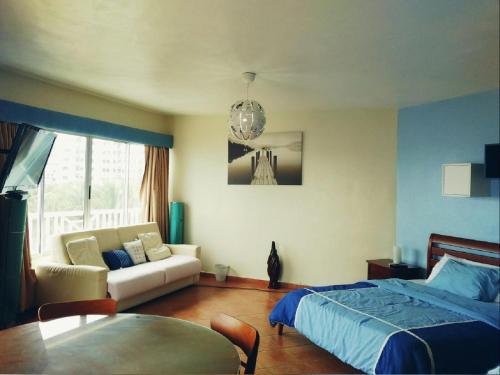 Postel nebo postele na pokoji v ubytování Villa Mar, Juan Dolio