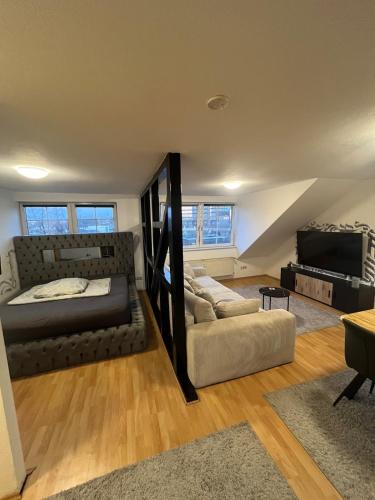 Giường trong phòng chung tại City-Loft am Rathaus Essen