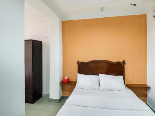 Cama o camas de una habitación en OYO 89584 Hotel Sahara Kuala Kubu Bharu