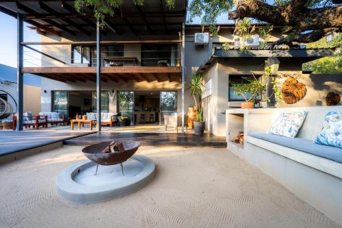 a house with a bowl in the middle of a living room at Rafiki Bush Lodge in Hoedspruit
