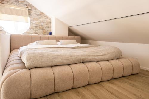 Postel nebo postele na pokoji v ubytování Pálavské Apartmány Original