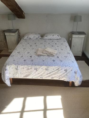 Postel nebo postele na pokoji v ubytování Joli gîte avec vue sur le château