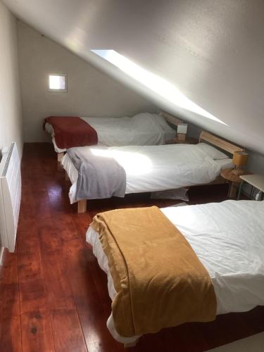 Postel nebo postele na pokoji v ubytování Joli gîte avec vue sur le château