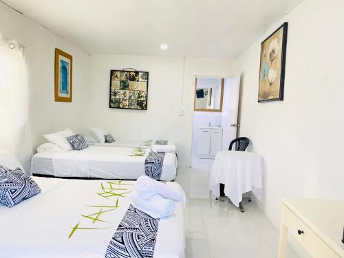 Voodi või voodid majutusasutuse Maota Hotel Apia toas