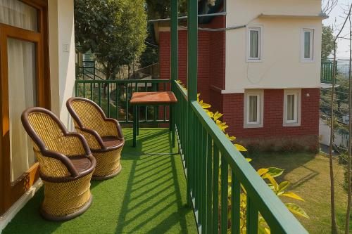 Balkón nebo terasa v ubytování Bougain Villa Cottage