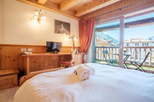 Posteľ alebo postele v izbe v ubytovaní Casa Moresc