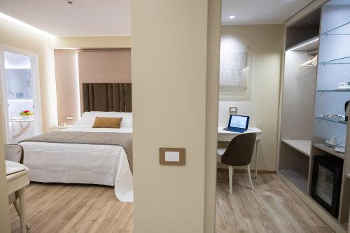 Voodi või voodid majutusasutuse Hotel Montreal toas