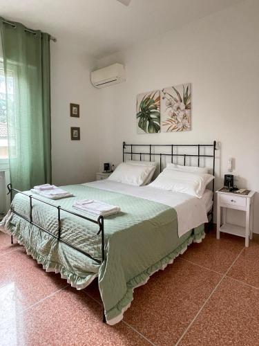 Ένα ή περισσότερα κρεβάτια σε δωμάτιο στο B&B House Bellaria