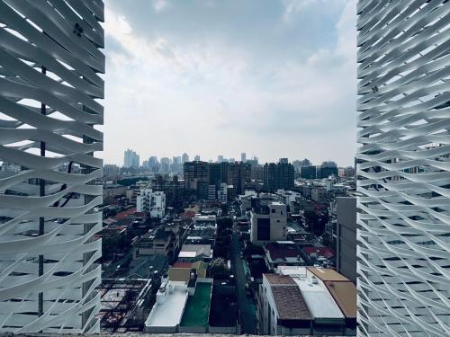 a view of a city with tall buildings at The Carlton Taichung in Taichung