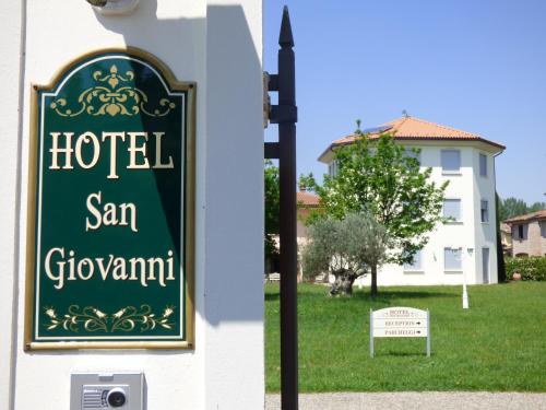 a hotel san giovanni sign on the side of a building at Boutique Hotel San Giovanni in San Giovanni in Persiceto
