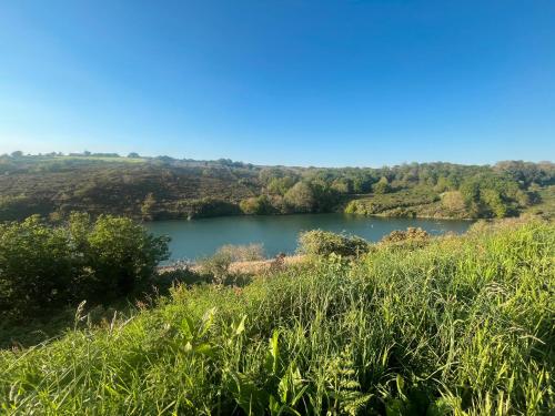 a view of a river from a hillside at Les Terrasses de la Palud in Landéda