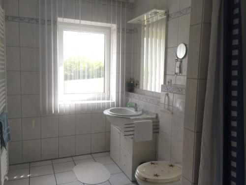 Ένα μπάνιο στο Ferienwohnung in Seenähe