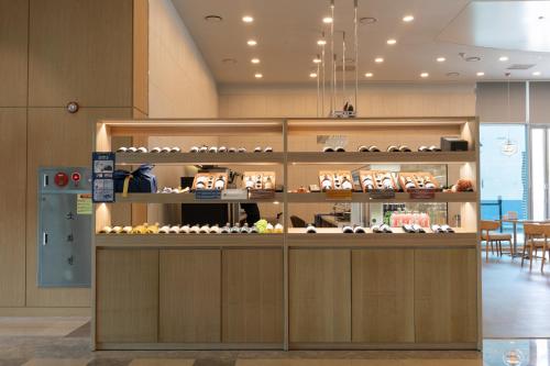 a bakery with a display case in a room at Harbor Park Hotel in Incheon