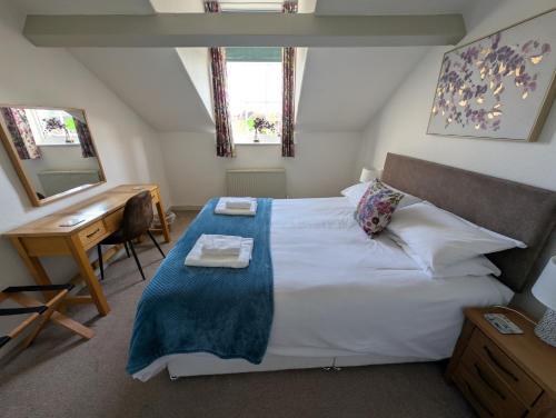 En eller flere senge i et værelse på Eastgate Lodge Flat 23B