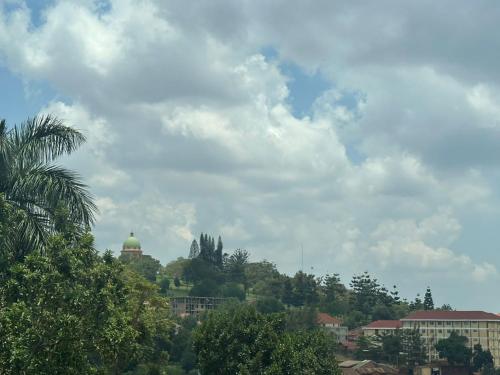 a view of a city with buildings and trees at Tampa Trace Homes in Kampala