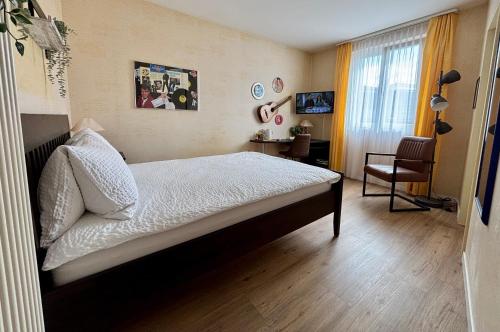 Postel nebo postele na pokoji v ubytování Hotel Movieworld