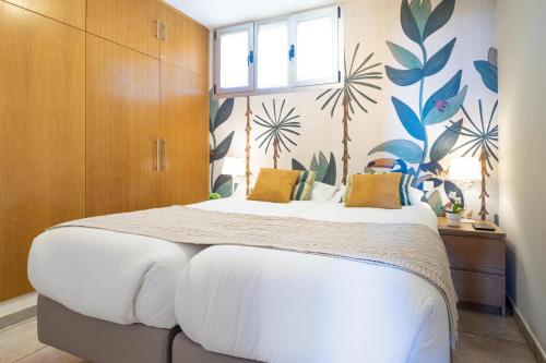 Ένα ή περισσότερα κρεβάτια σε δωμάτιο στο Ático Apartamento Las Burras Playa by VillaGranCanaria
