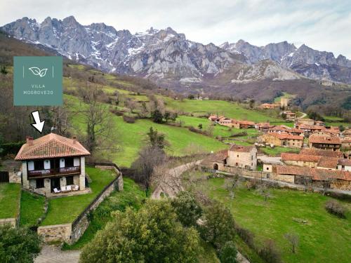 an image of a village with mountains in the background at Villa Mogrovejo in Mogrovejo