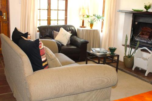 a living room with a couch and a chair at Soli Deo Gloria in McGregor