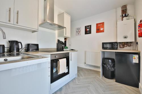 Kuchyň nebo kuchyňský kout v ubytování Hiks Accommodations