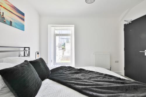Postel nebo postele na pokoji v ubytování Hiks Accommodations