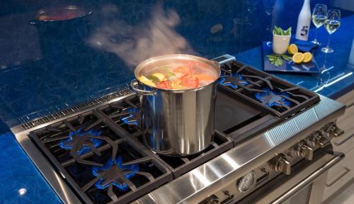 a pot of food sitting on top of a stove at Meridian Blu in Marco Island
