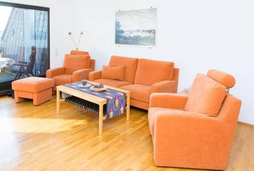 Posezení v ubytování Ferienwohnung direkt am Rhein in Neuwied bei Koblenz