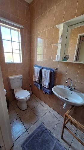 Koupelna v ubytování Capbon Guesthouse