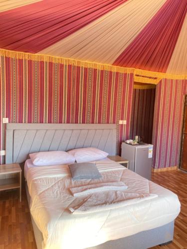 Ein Bett oder Betten in einem Zimmer der Unterkunft Martian landscape camp
