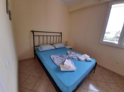 Katil atau katil-katil dalam bilik di Sea View Luxury Apartments Palase Dhermi