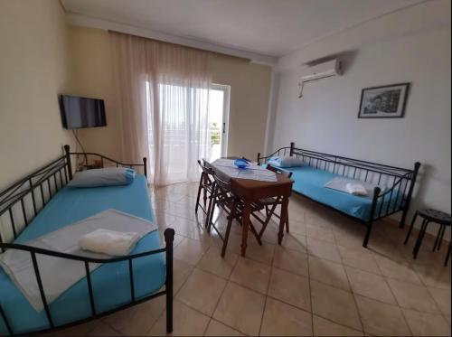 Katil atau katil-katil dalam bilik di Sea View Luxury Apartments Palase Dhermi