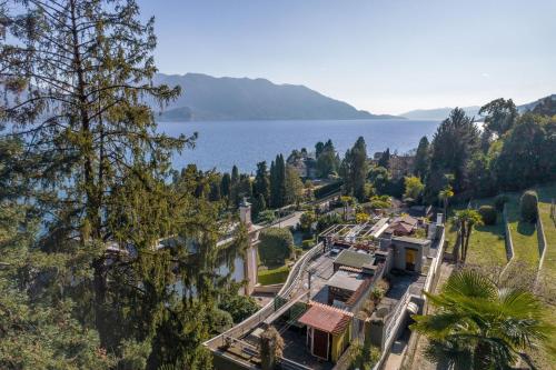 an aerial view of a resort with a train track next to the water at Vera in Oggebbio