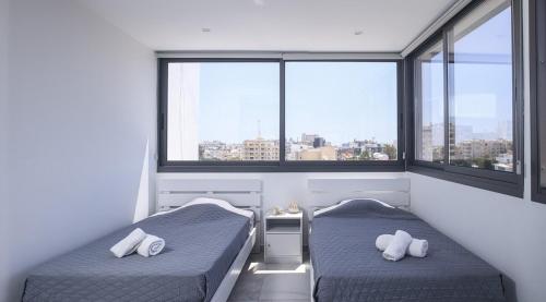 Postel nebo postele na pokoji v ubytování Elegant penthouse in City Centre