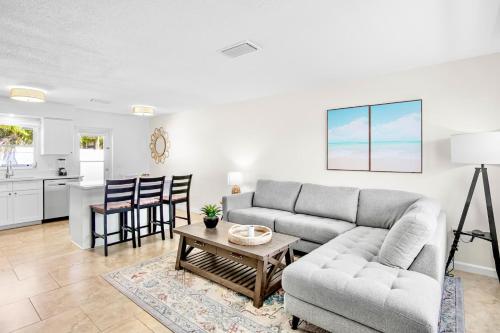 a living room with a couch and a table at Southern Breeze 2 in Anna Maria