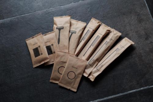 a group of paper bags with the words ovation at Funaya Raku 樂 in Kameshima