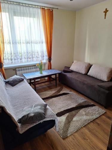 Χώρος καθιστικού στο Apartament PodJasnoGórski