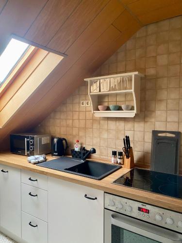 Kuchyň nebo kuchyňský kout v ubytování Haus Bergblick
