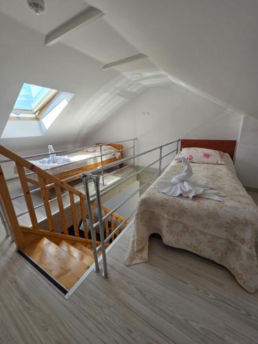 Postel nebo postele na pokoji v ubytování Apartamenty Zachodnia Przystań