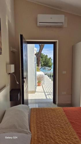 Ένα ή περισσότερα κρεβάτια σε δωμάτιο στο Le Zagare