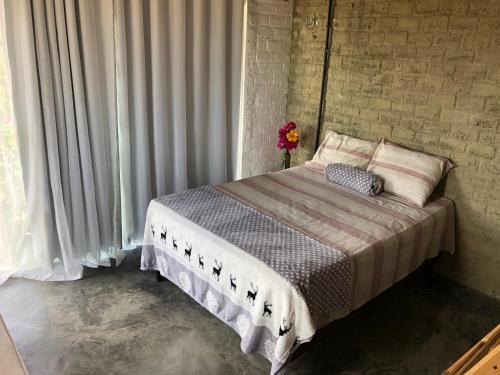 Postel nebo postele na pokoji v ubytování Paradise Camp