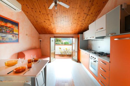 Kuchyň nebo kuchyňský kout v ubytování Moresco Apartment