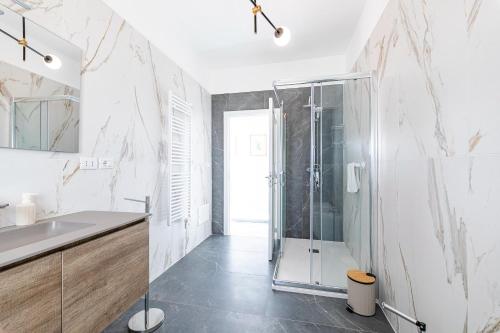 a bathroom with a shower and a sink at Solaris Apartments in Veglie