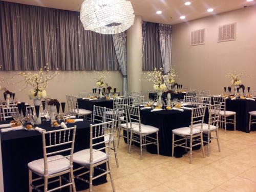 a set up for a banquet with tables and chairs at Pointe Plaza Hotel in Brooklyn