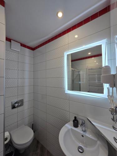Koupelna v ubytování Apartamenty Zachodnia Przystań