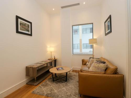 Coin salon dans l'établissement Flat 53