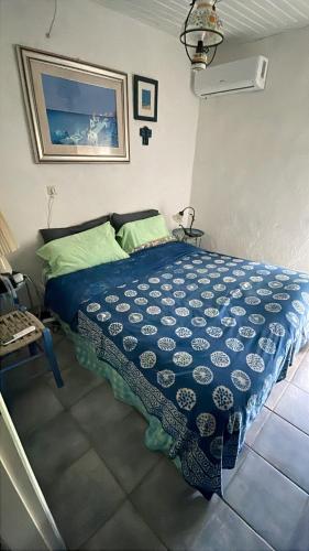 Ένα ή περισσότερα κρεβάτια σε δωμάτιο στο Tritzi house